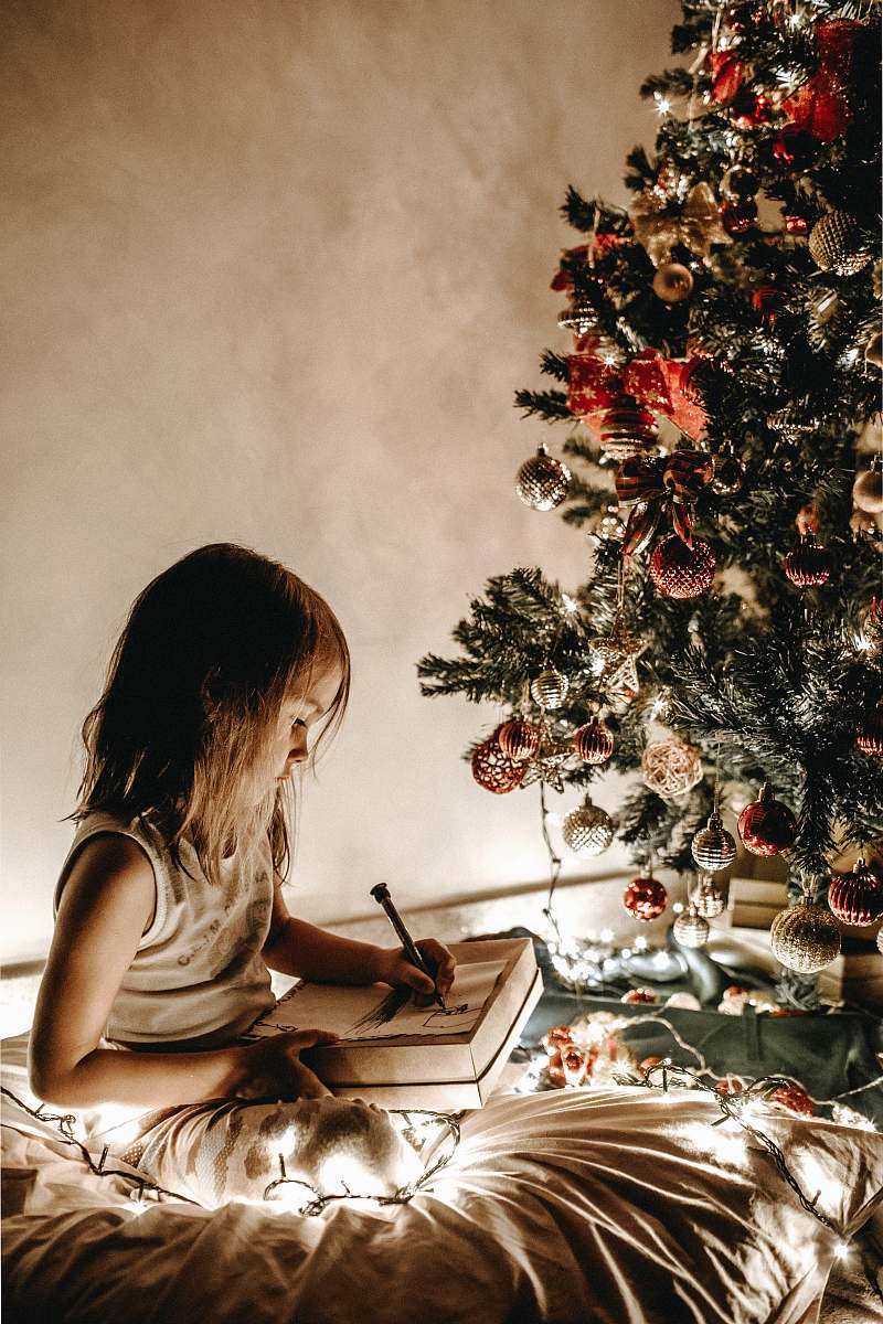 tree girl writing on bed plant